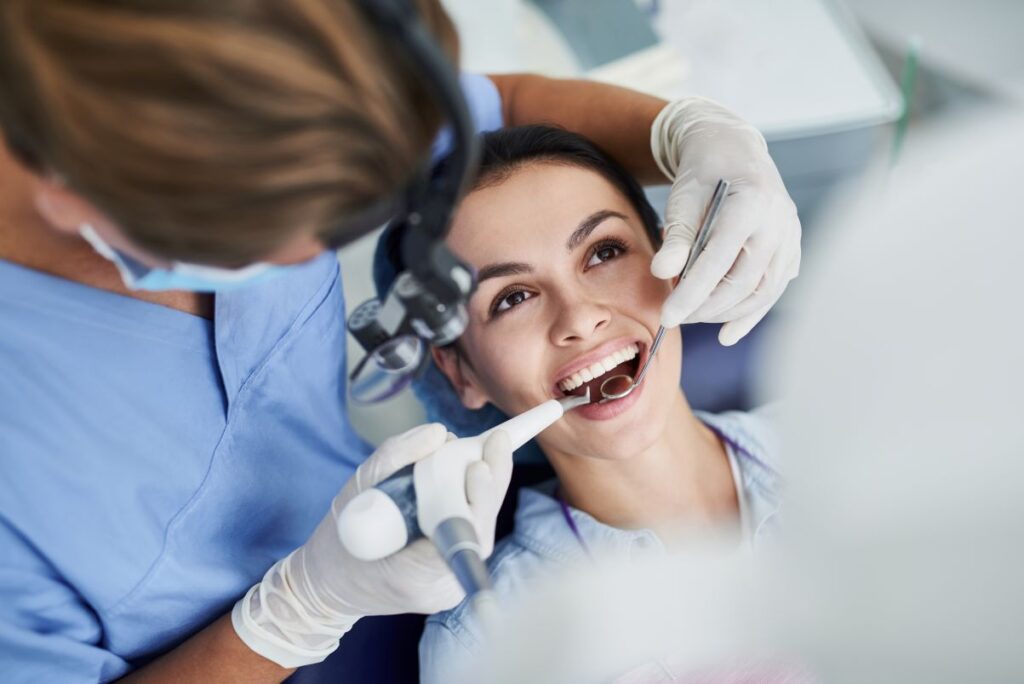 A woman getting a dental cleaning