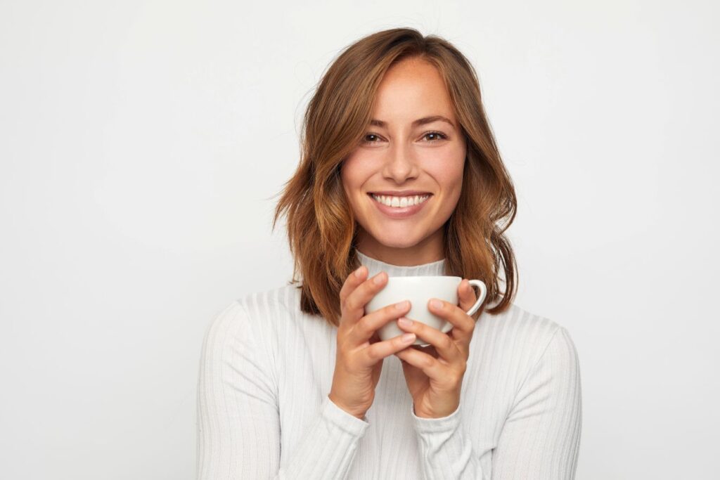 A woman drinking coffee