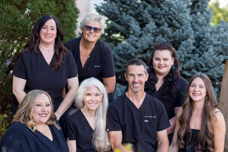 Doctor and team members at Dedicated Dentistry in Lakewood, CO.